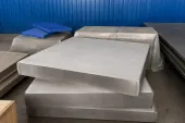 Real wrought titanium plate stock represents one product form in a controlled medical-material supply chain; it is not an implant.