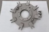 A real machined titanium component represents the titanium side of a hybrid material architecture; it is not the research specimen.