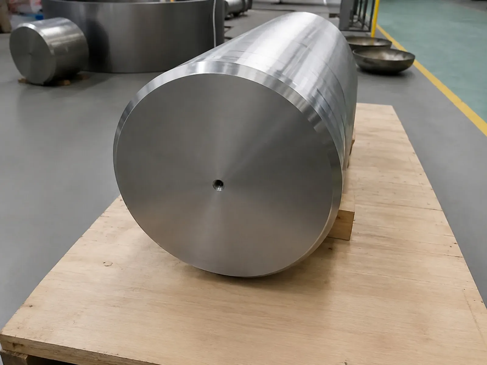 A representative large titanium billet illustrates upstream metal availability; it is not identified as material from any Farnborough exhibitor or aircraft program.