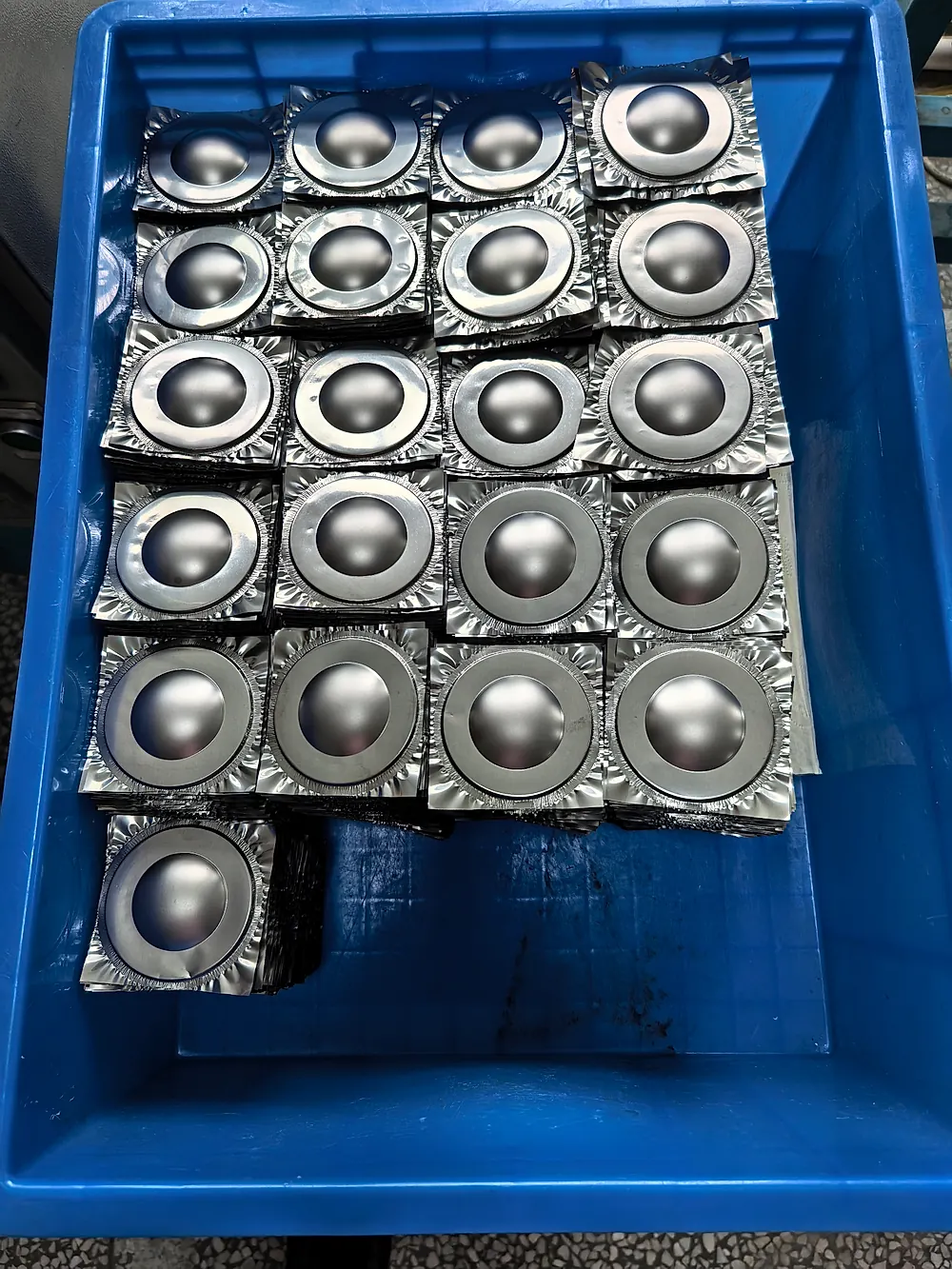 Thin-wall titanium stamped parts in volume production, PEM bipolar plate parts measured at the Titanium Valley port
