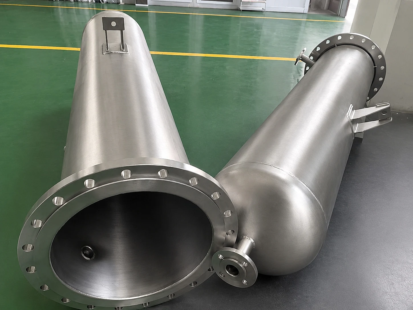 Titanium pressure vessel shells with flanges and formed ends