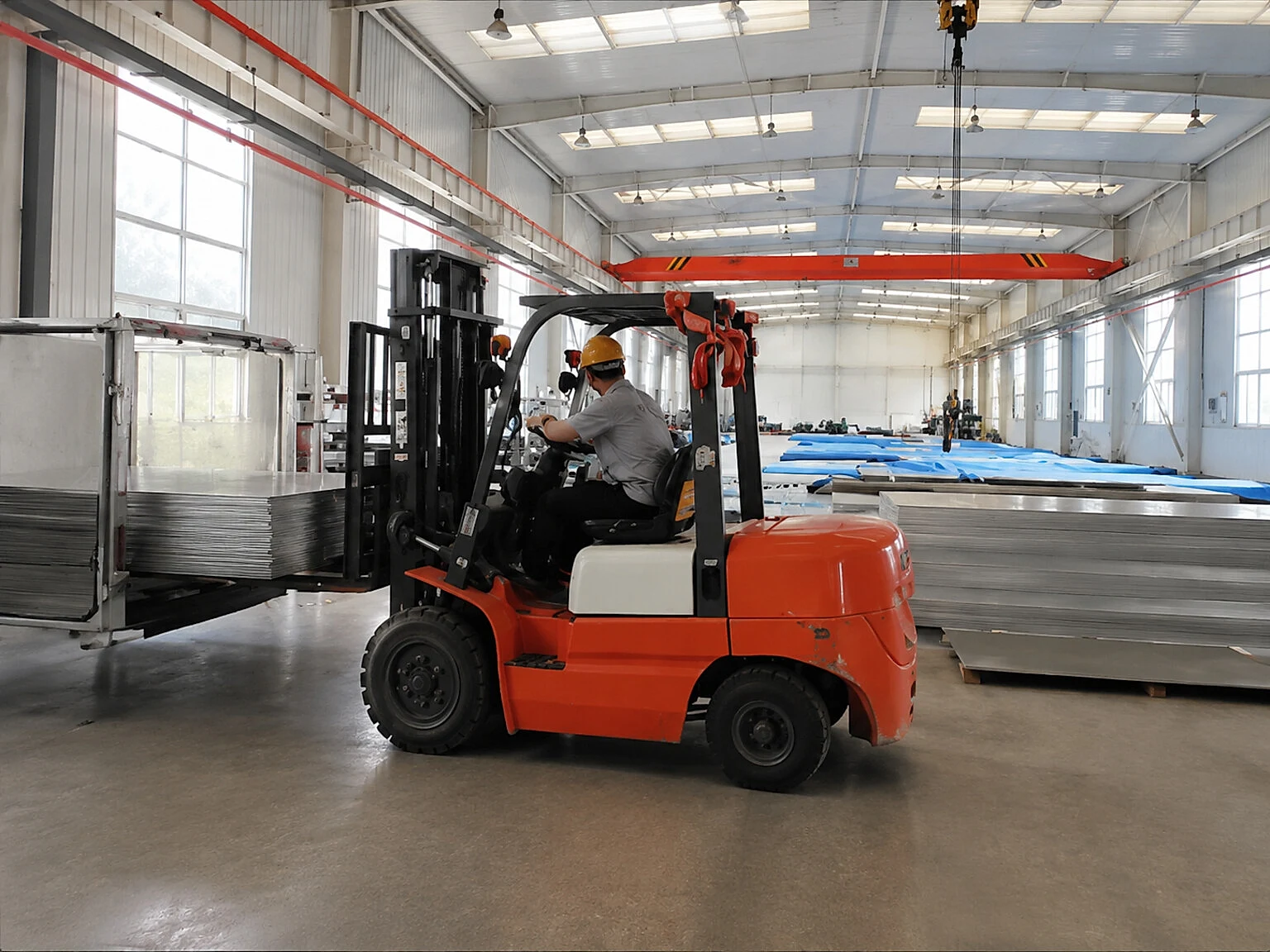 Titanium material being handled in a warehouse, highlighting logistics and release-record continuity before shipment or repair stock use.